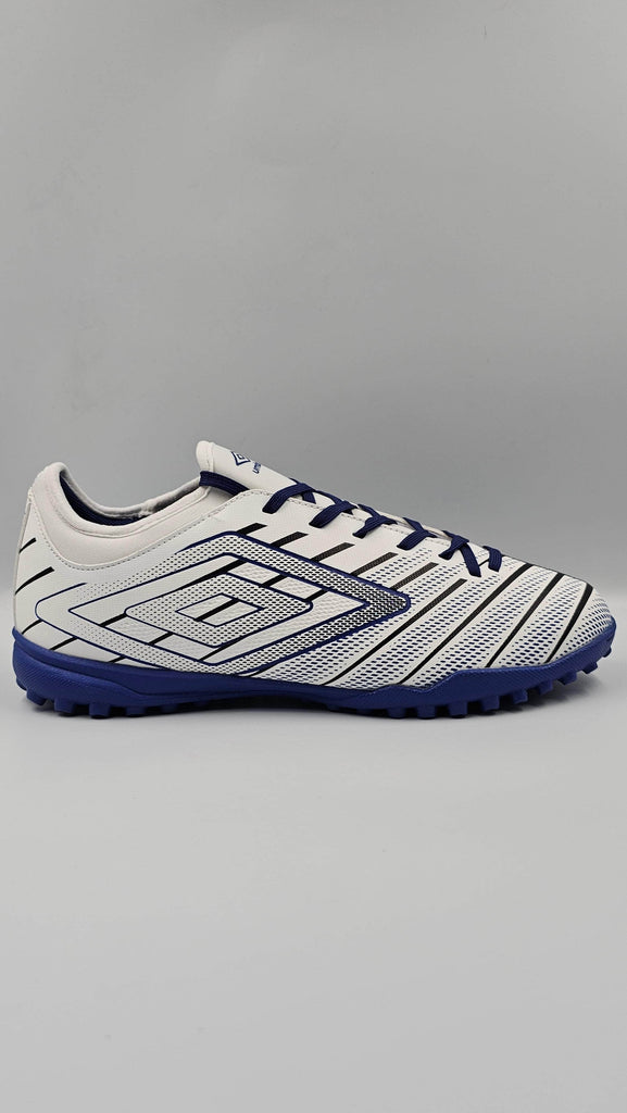 Umbro Tenis Soccer Tenis Umbro Velocita Elixir Club Tf Blanco/Azul Tenis Umbro Velocita Elixir Club Tf Blanco/Azul